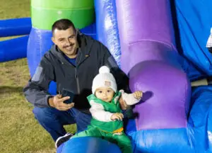 Father-and-baby-bounce-house-AMS-Event